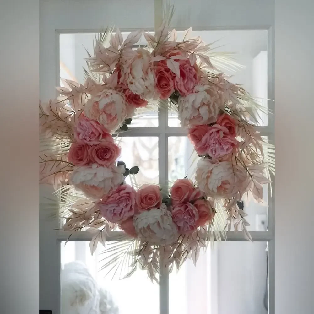 Whispy palm fronds beachy blooming tropical blush + coral grapevine wreath